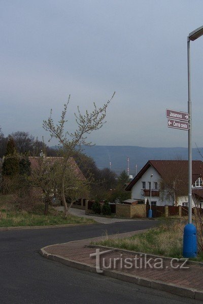 2.View from Nová Ves of the three chimneys of the largest technical glass factory in Europe and