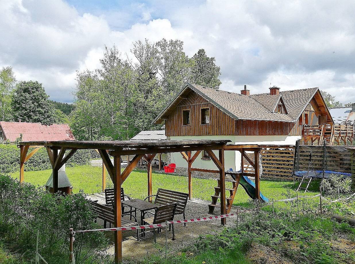 Apartamentos - asientos en el jardín