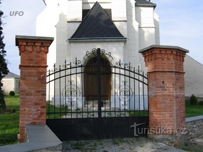 gate of the church in Úbla