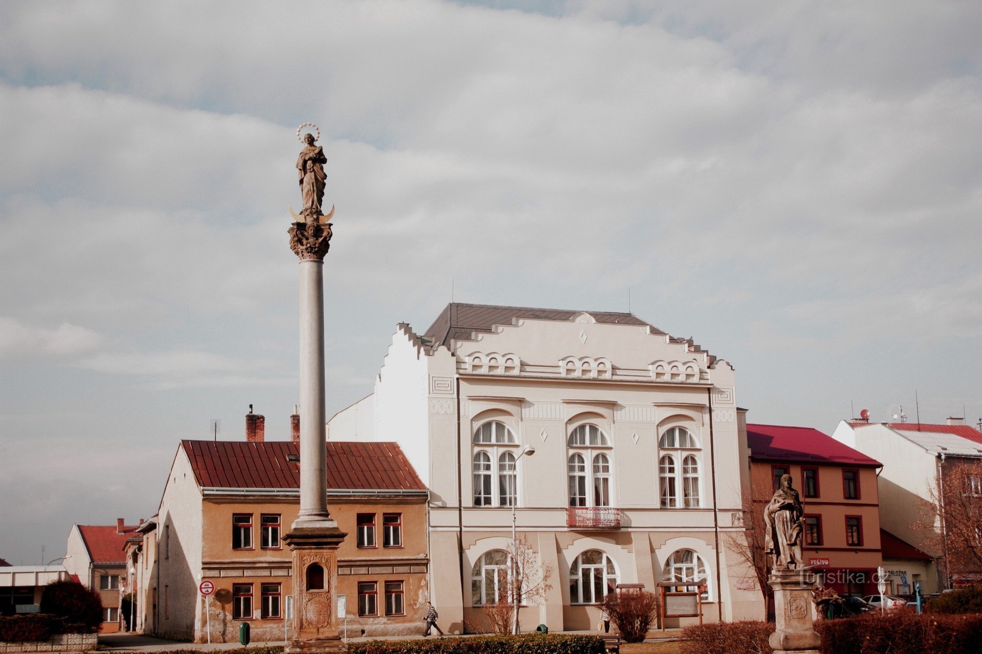 The former U zlatého křížku inn in Kojetín and Josef Mánes