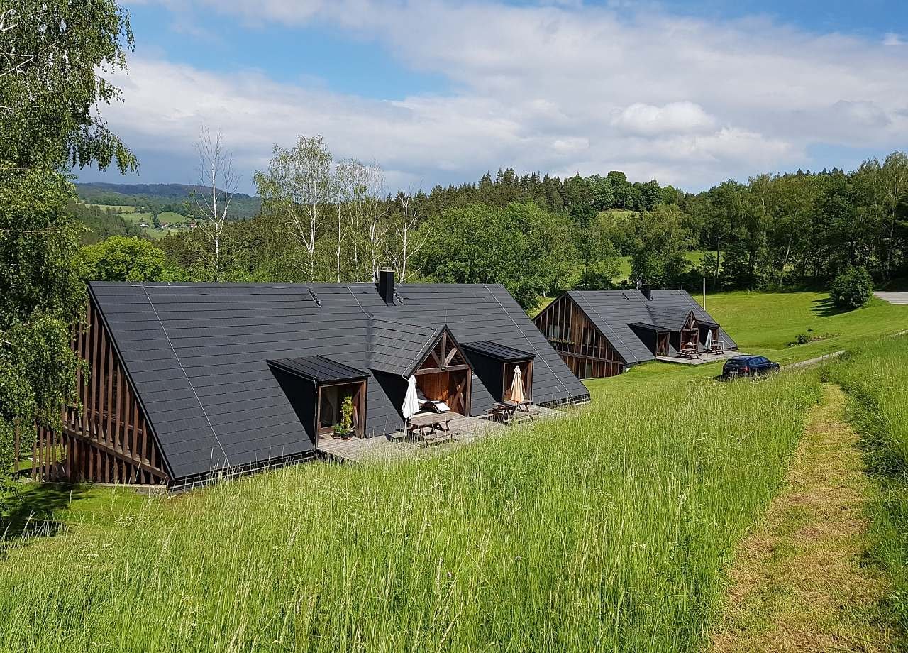 As casas Rajsko estão isoladas no Šumava PLA