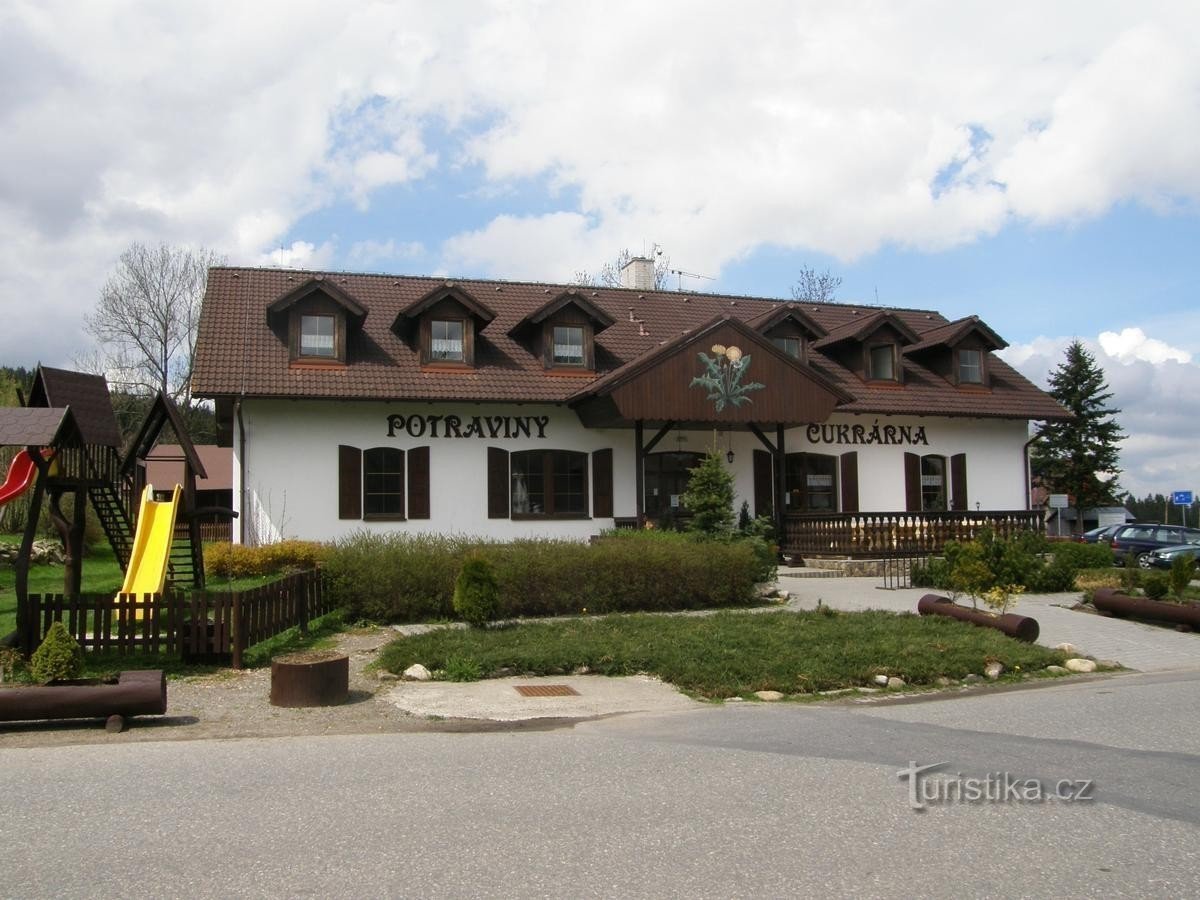 You will find a pastry shop and a grocery store next to each other