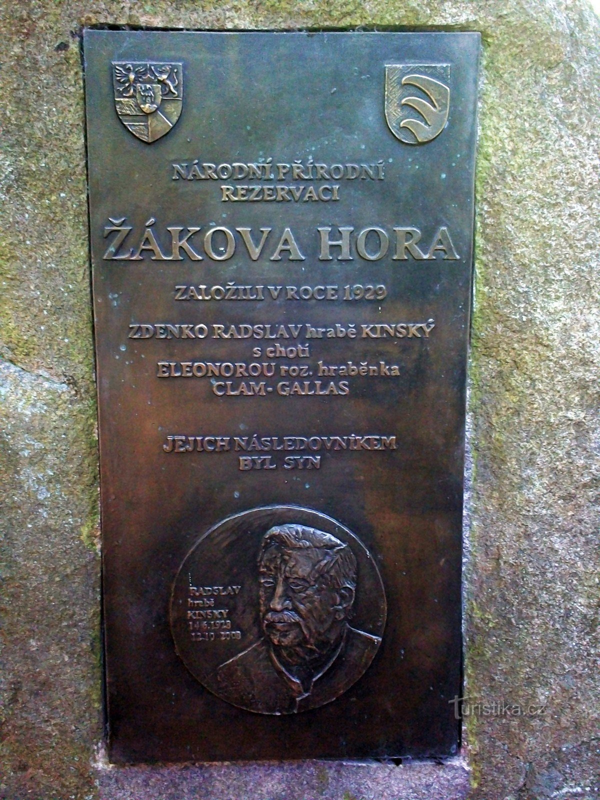 A plaque on the monument under Žáková Hora