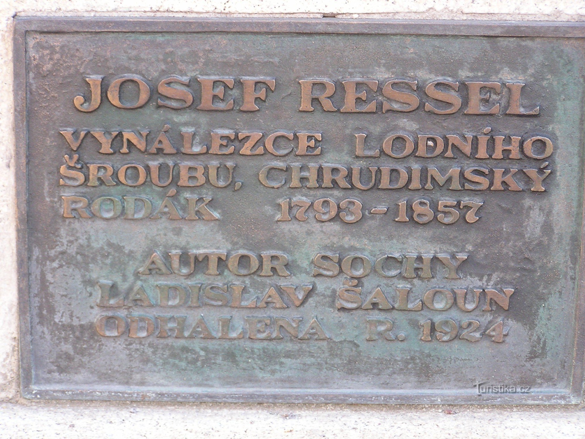 plaque on the statue