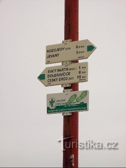 Chi tiết biển chỉ dẫn: Biển chỉ dẫn: con đường được đánh dấu màu xanh lá cây - Jevany - Kozojedy - Doub