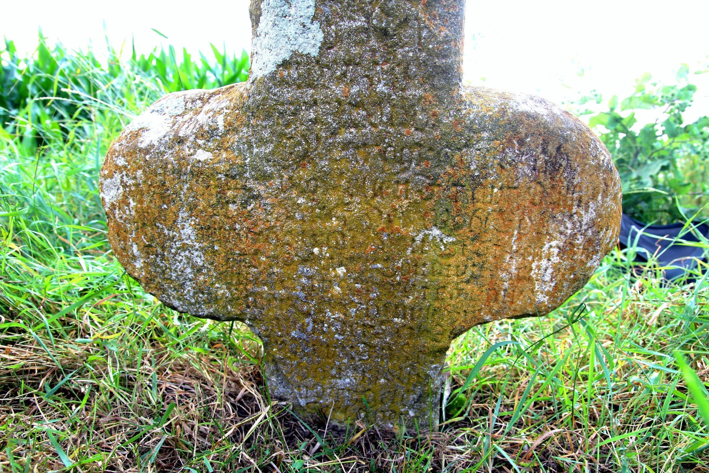 Detail of the cross of reconciliation with a difficult to read description