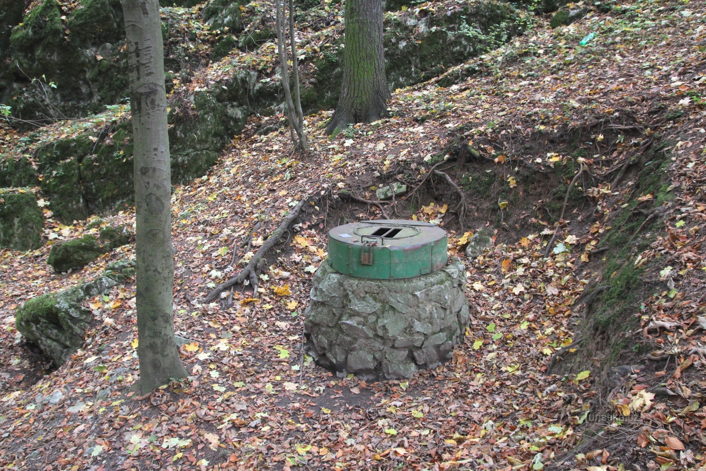 Today's entrance to the Queen of Spades cave is a circular shaft