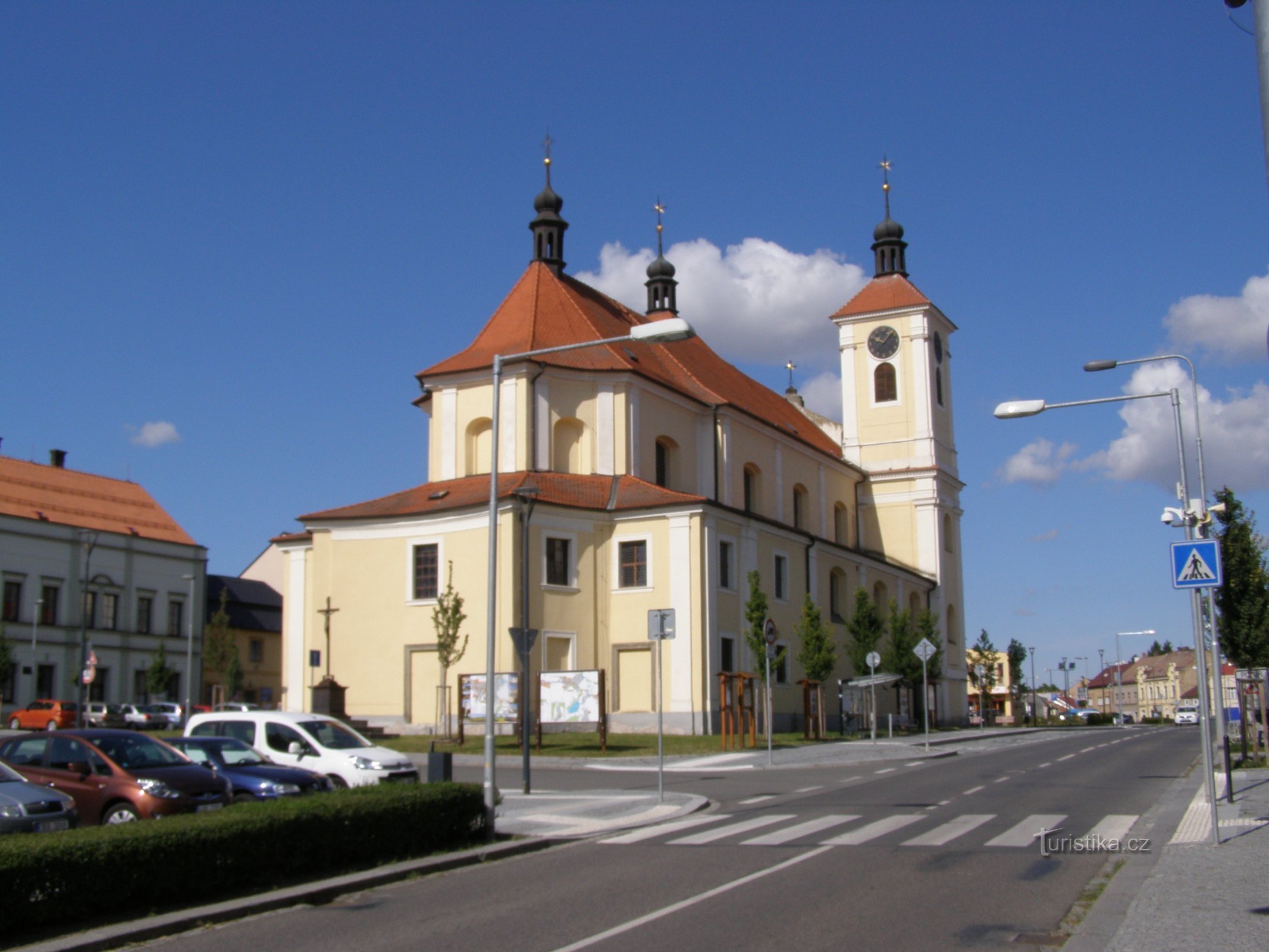 the dominant feature of the square in Chrasti, the Church of the Holy Trinity