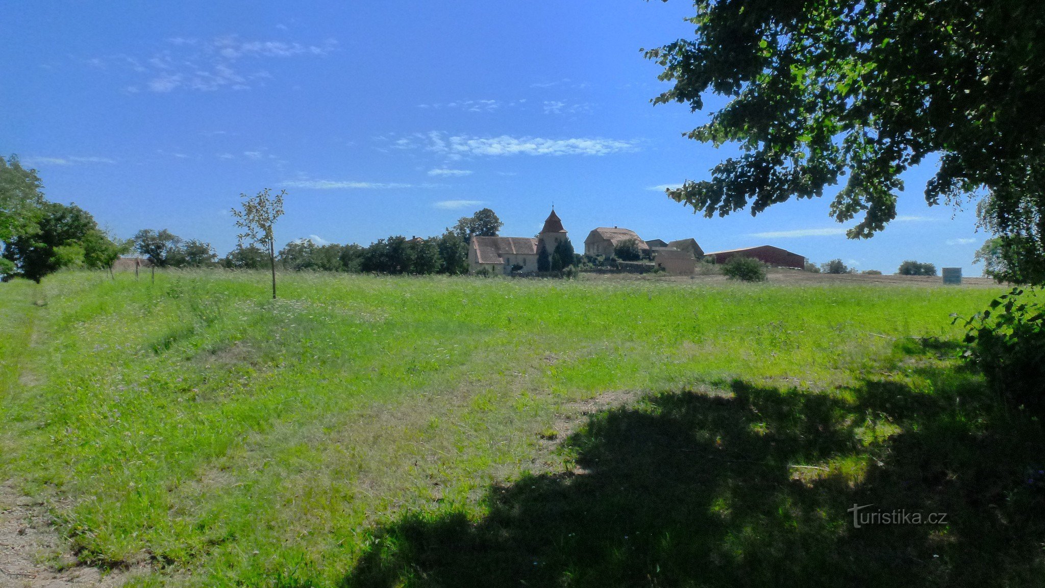 The dominant feature of the village is the early Gothic church of St. Martin, which is already mentioned