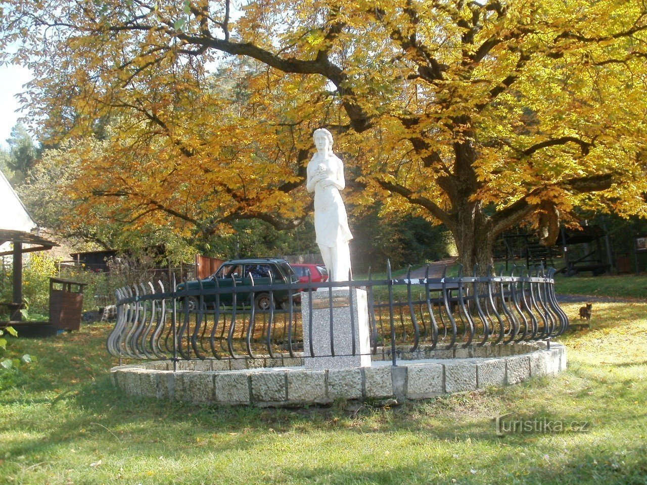 Helenka in front of the hunting lodge