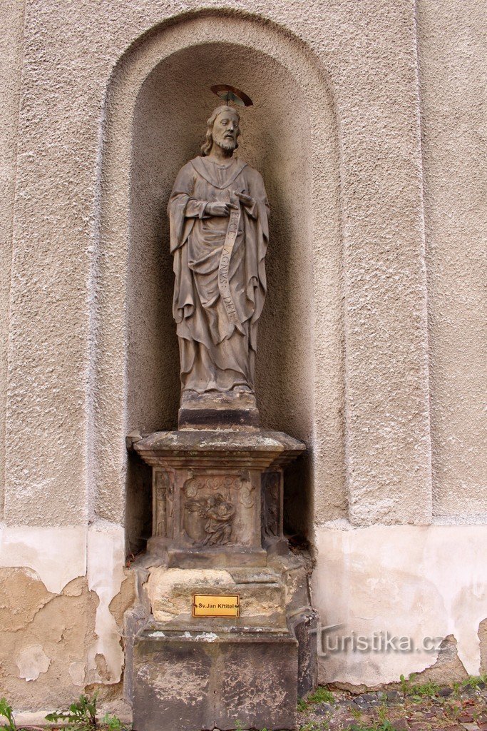 Tomb, statue of St. John the Baptist