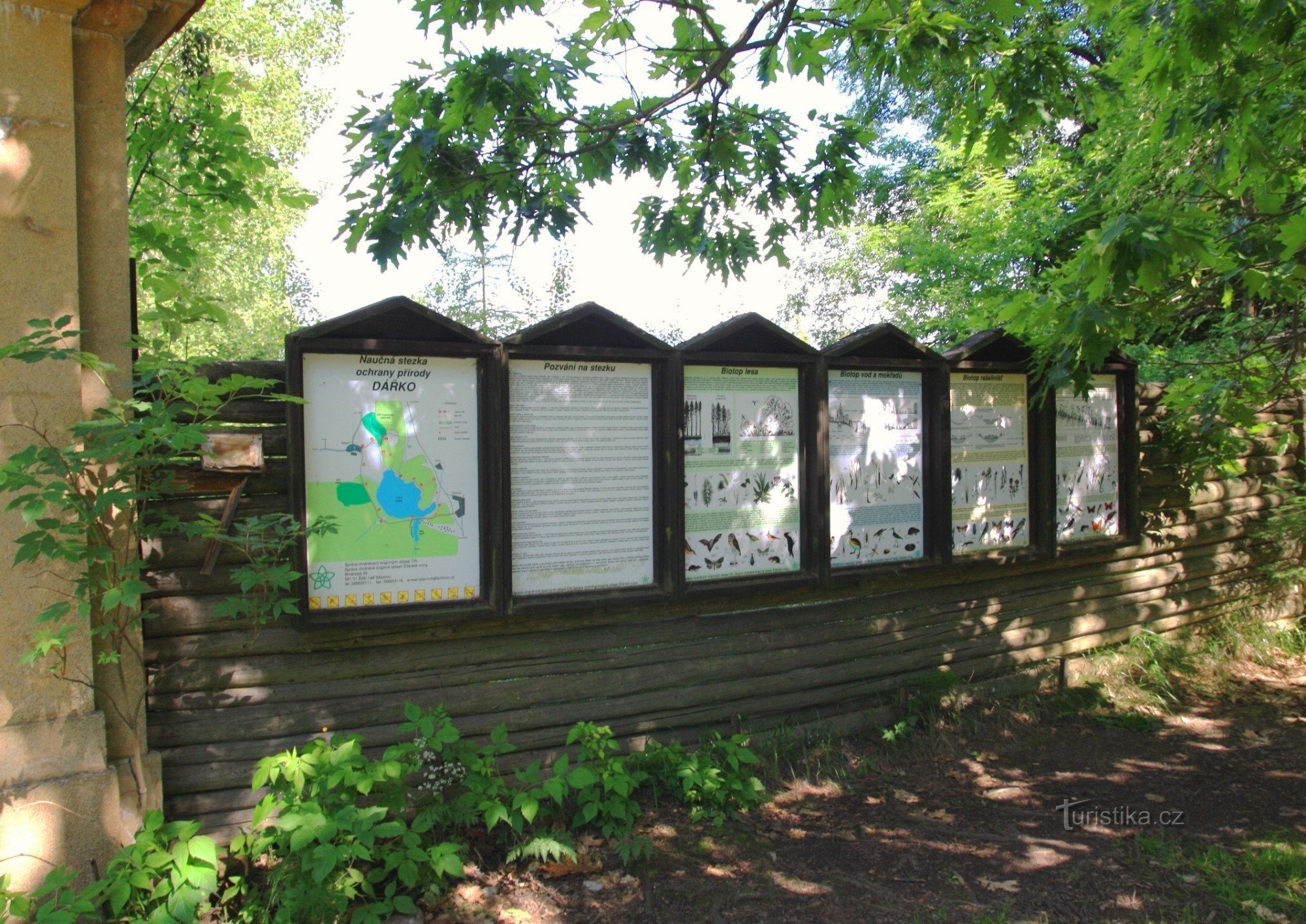 Information board at the beginning of the educational trail at the entrance to the former branch