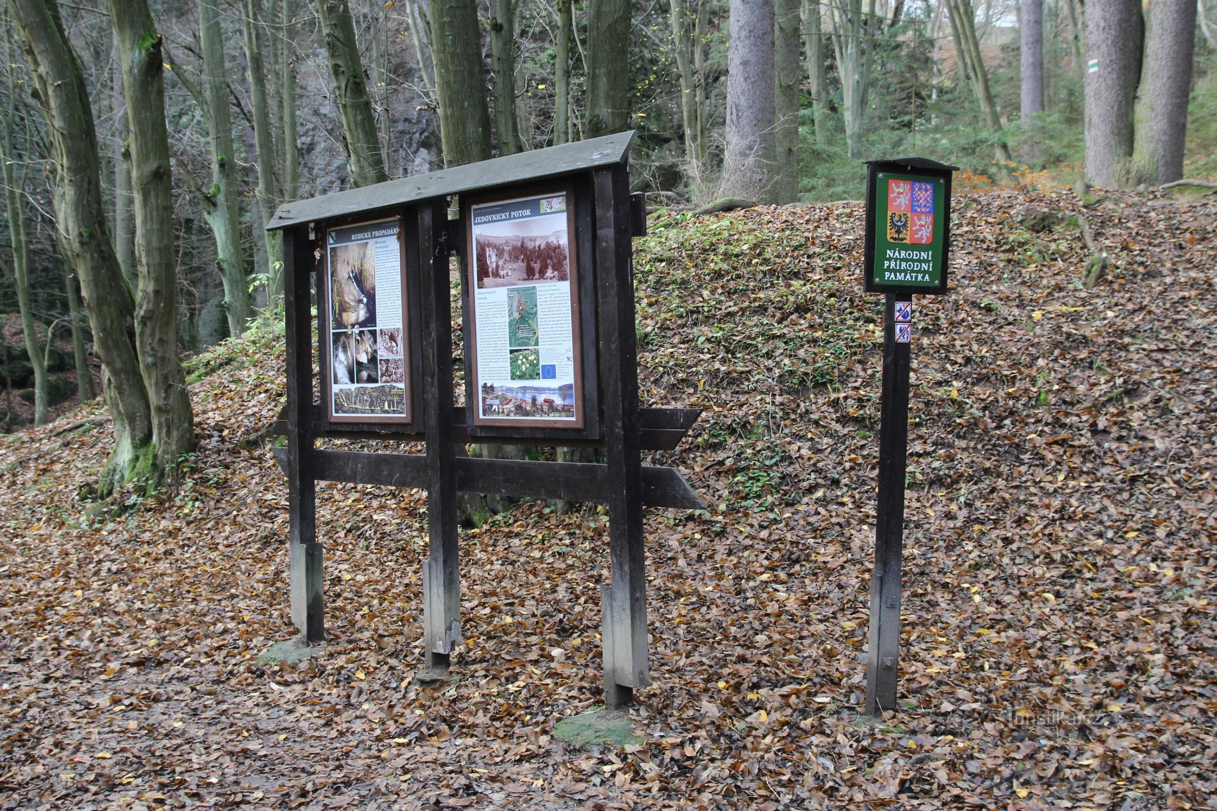 Information board about the Jedovnické stream and the Rudické subsidence