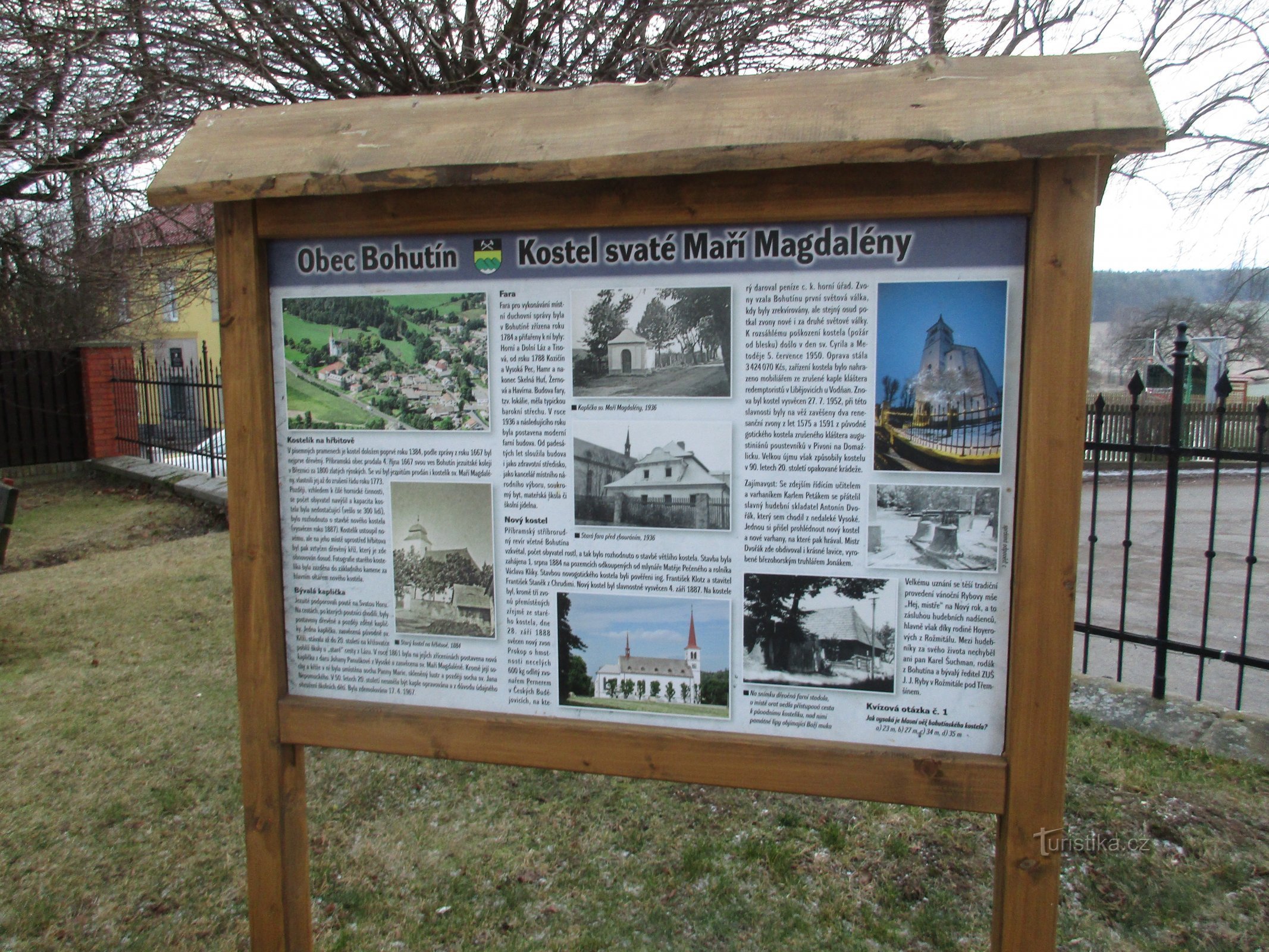 information board in front of the church