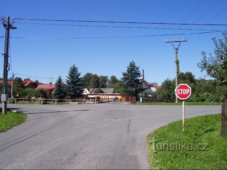 Jakartovice: Crossroads in the village with a bridge over a stream