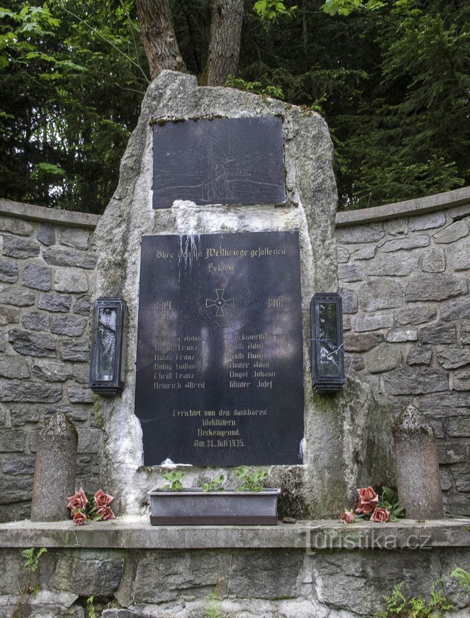 Stone with memorial plaques