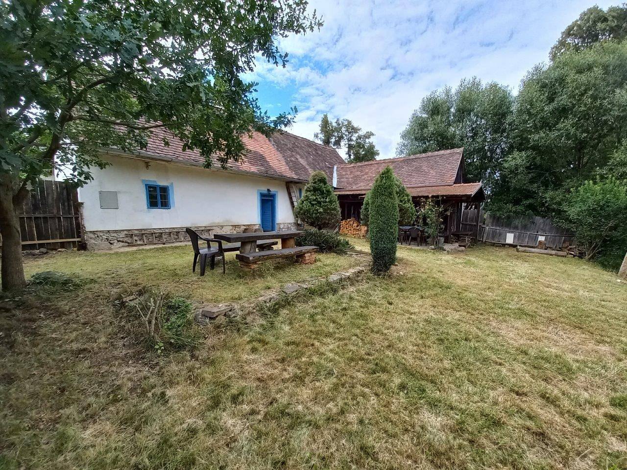 classic cottage, with a closed plot, two outdoor sitting areas and a fireplace