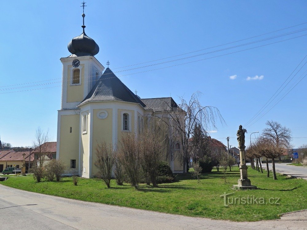 the church of All Saints and the statue of St. Floriana