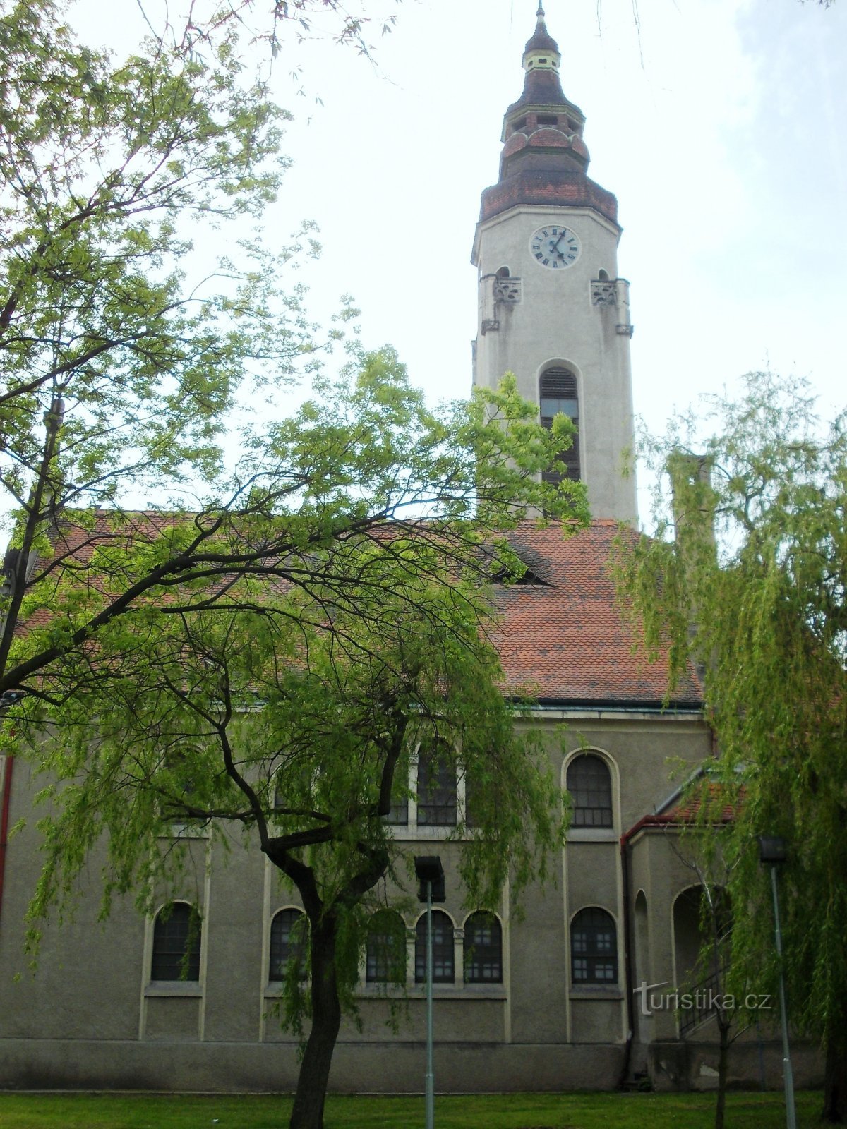 a church with an almost 42 meter high tower