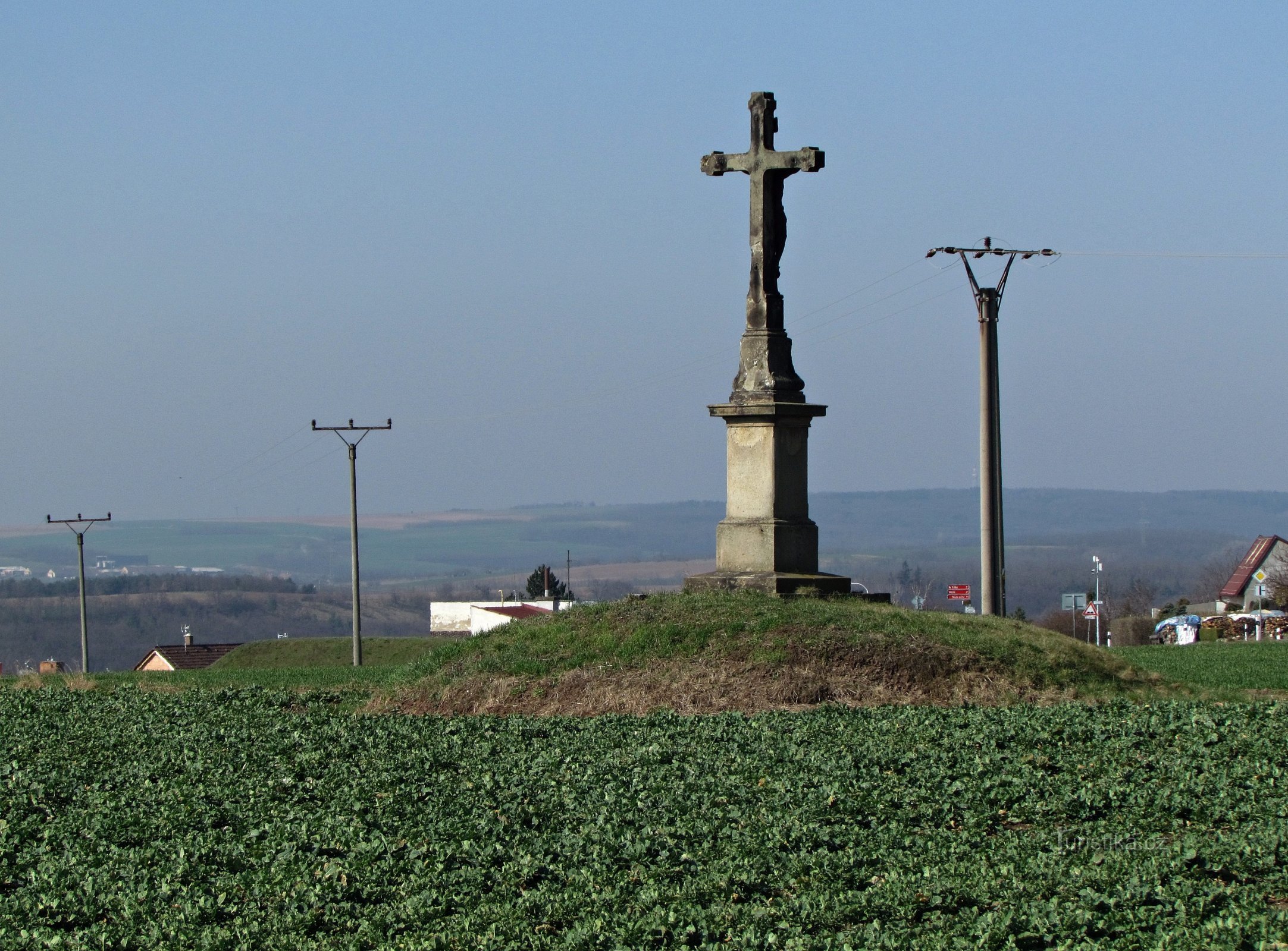 cross on the edge of town