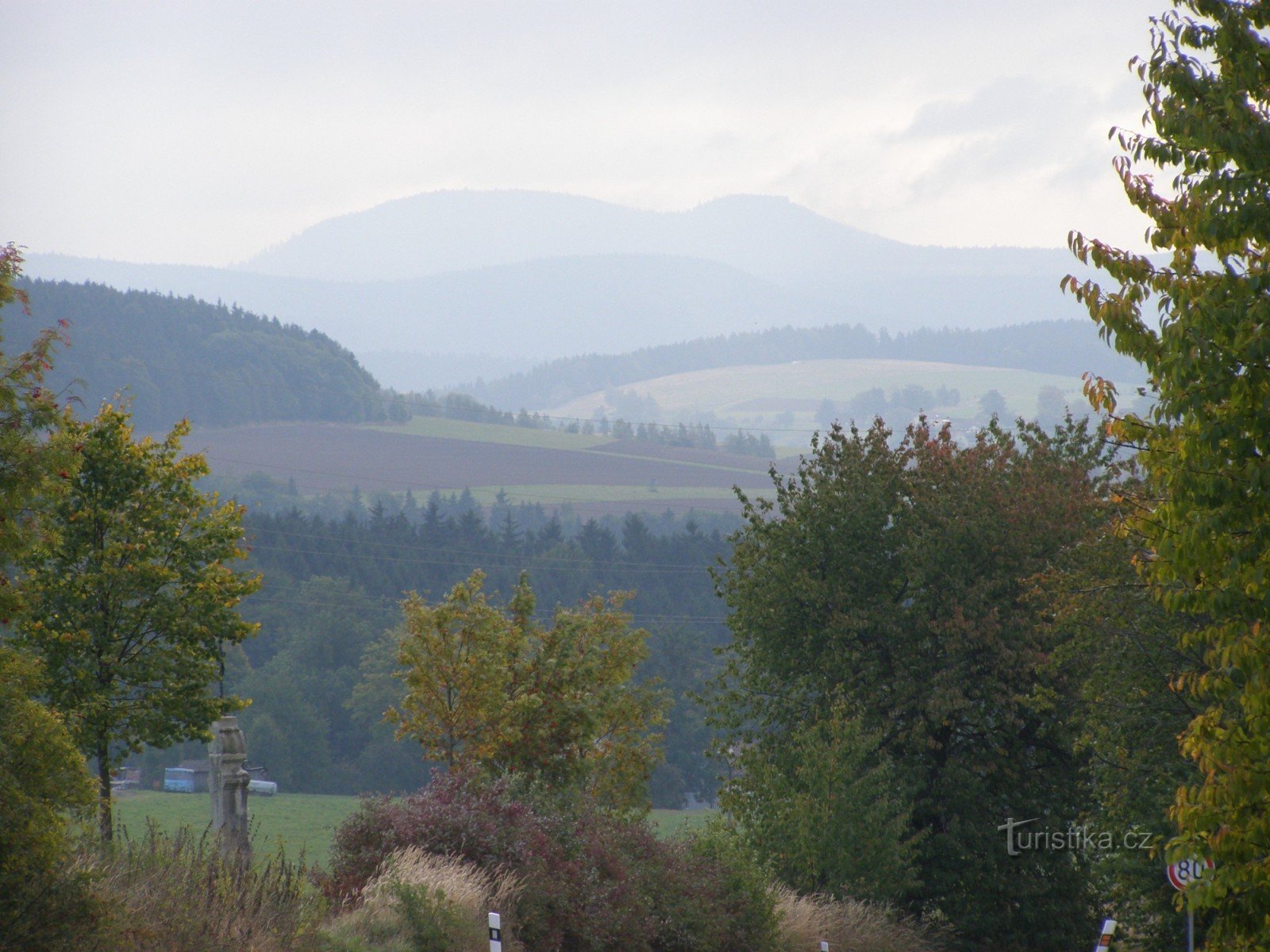 cross above Pěkov - view of Hejšovína