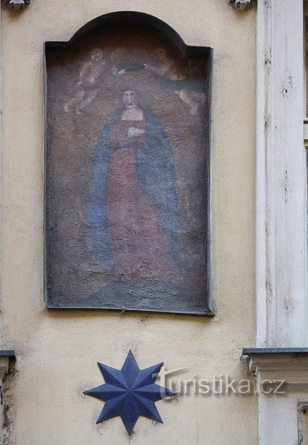 玛丽安图像和房子标志
