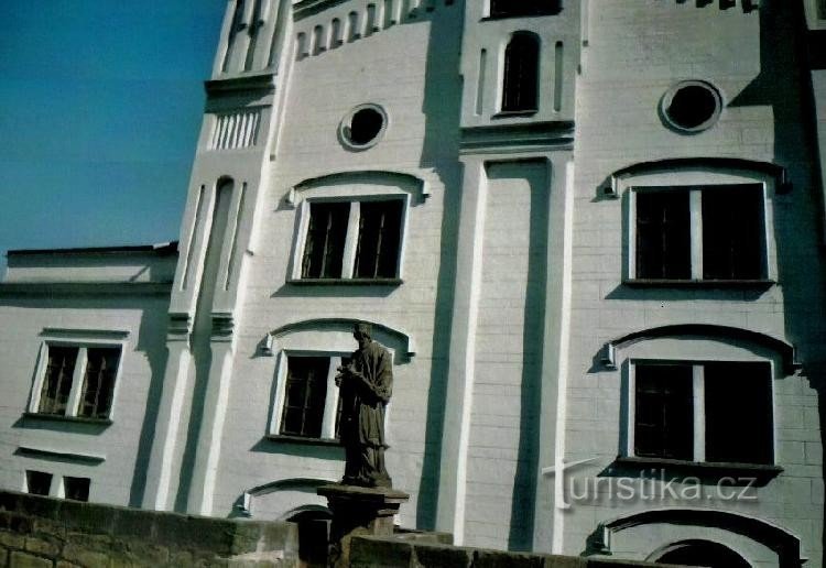 The mill and the statue of St. J. Nepomucký