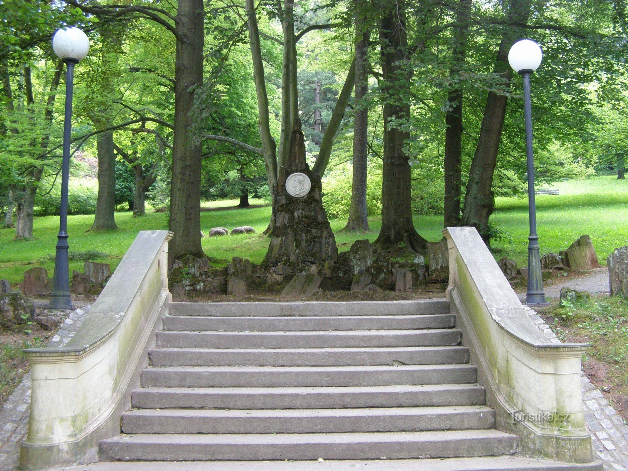 A mound of petrified wood with a portrait of the poet Schiller