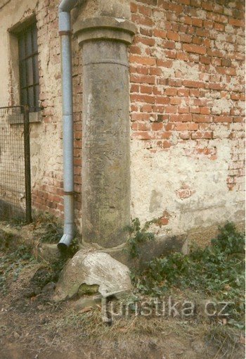 Plague pillar on the corner of the garage