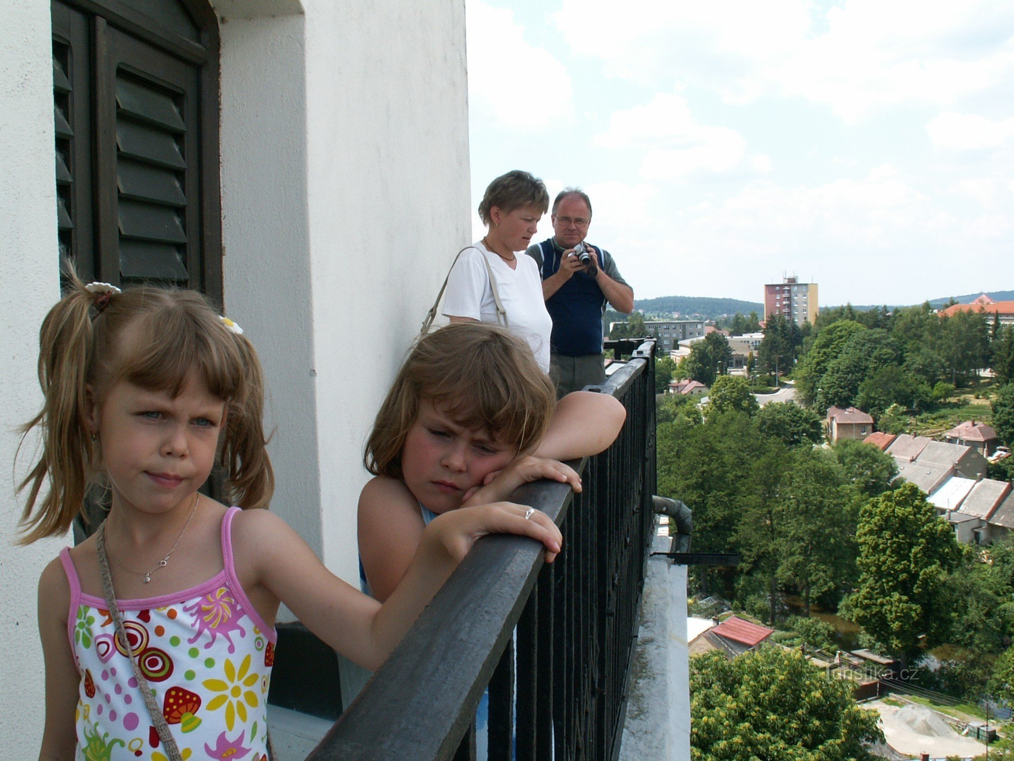 On the walkway of the church tower