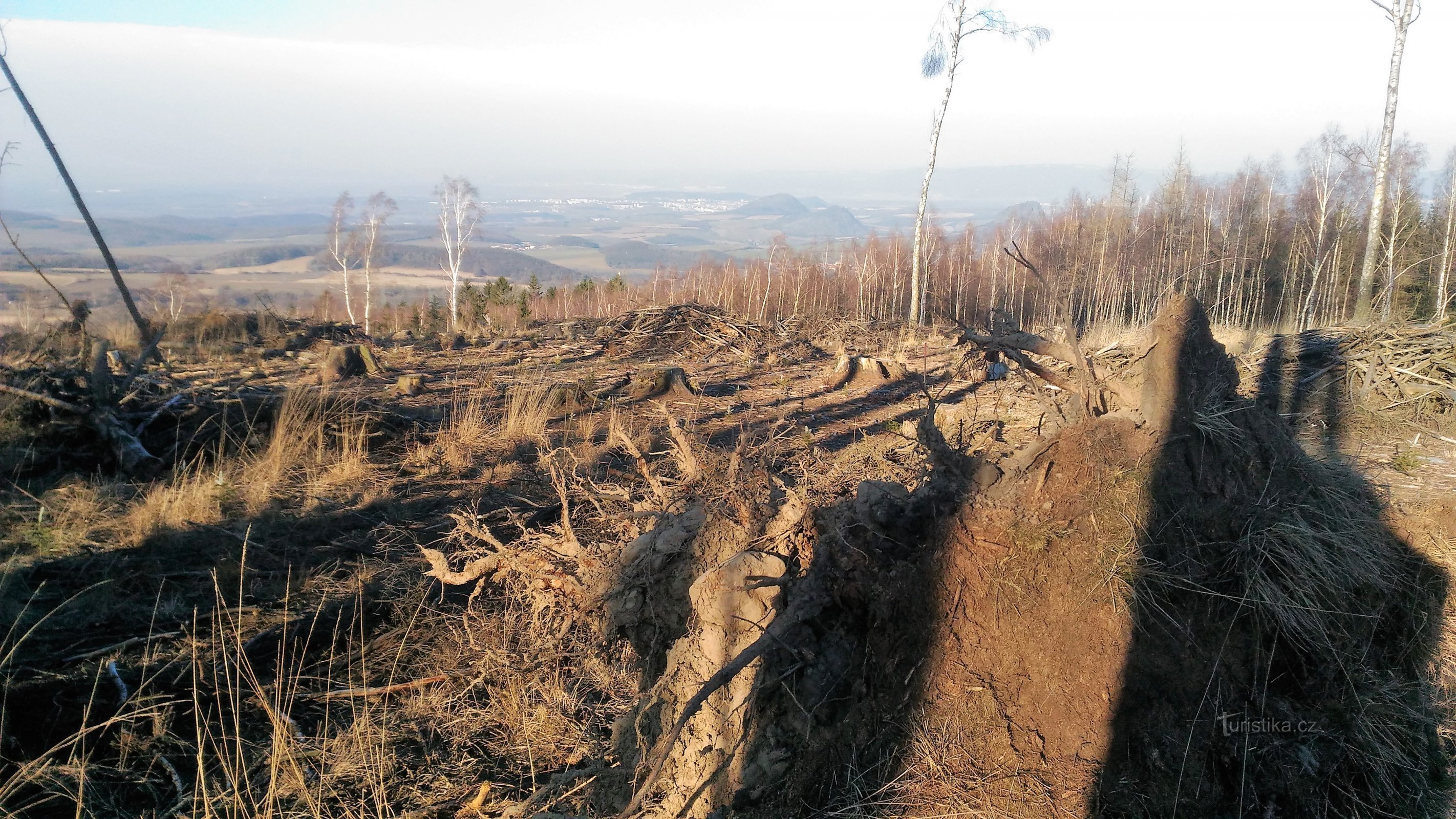 To the peaks of the massif of the second highest mountain in the Czech Central Mountains.