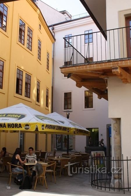 Courtyard of a house with a statue