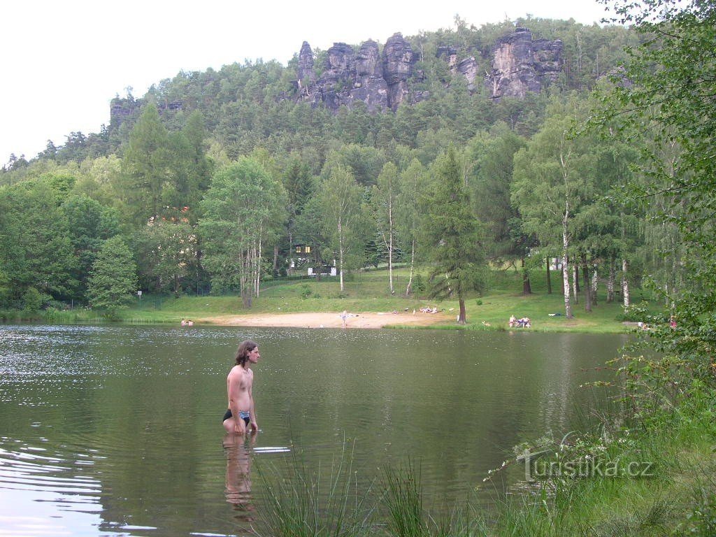 Ostrovské natural swimming pool in the background with Ostrovské rocks