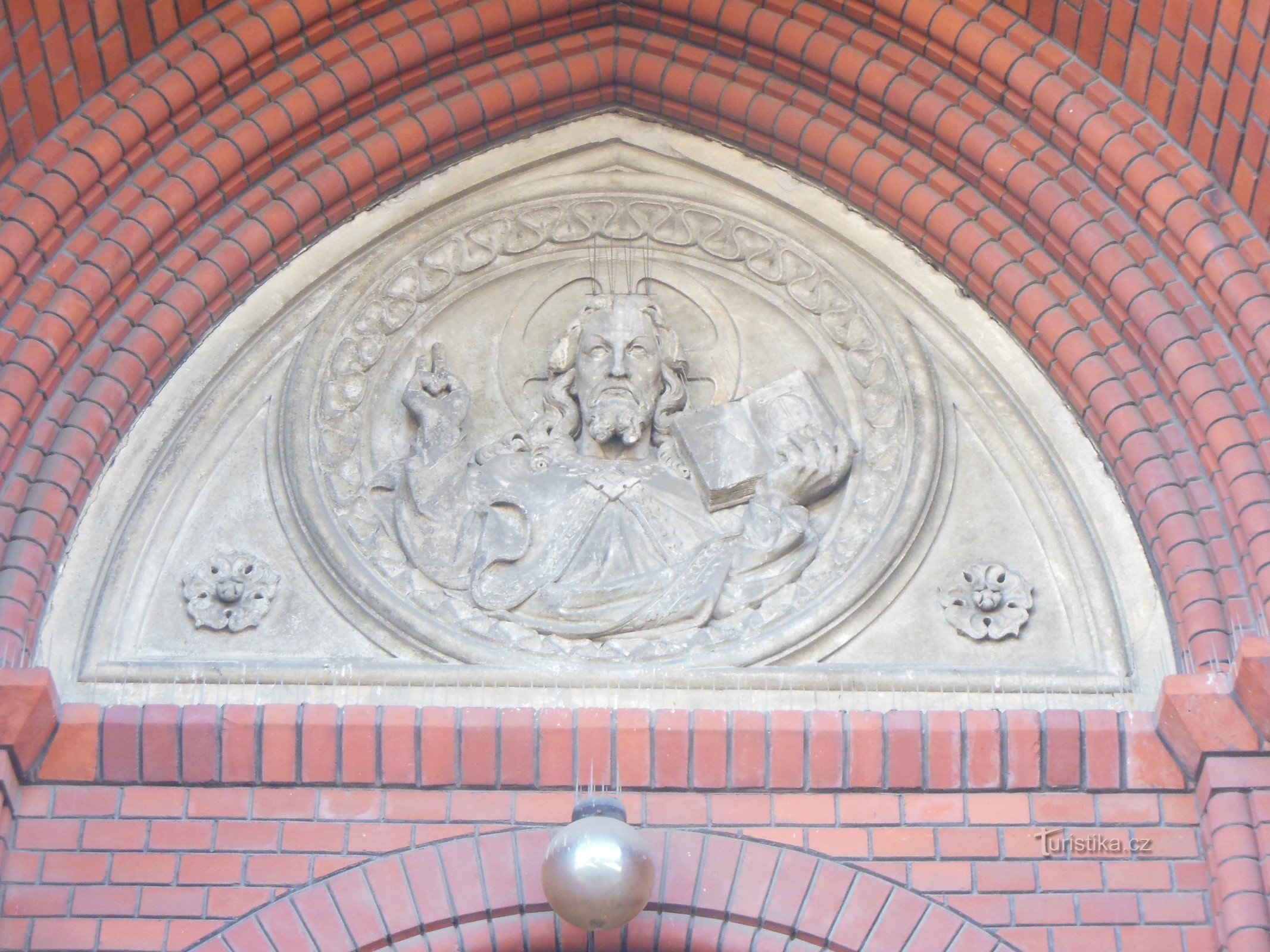 sculpture above the entrance