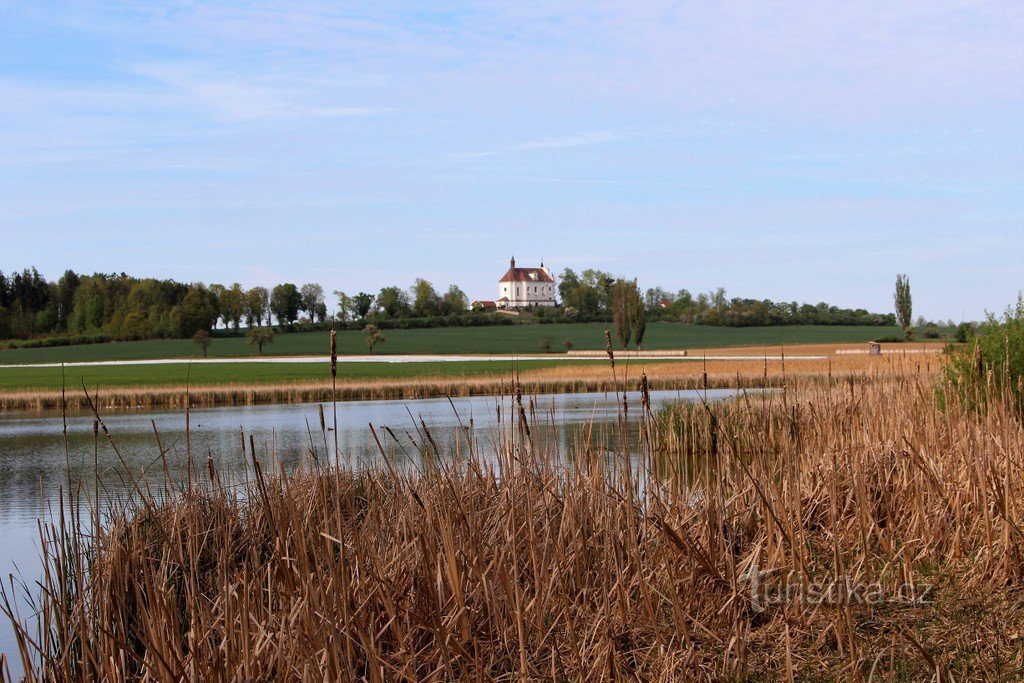 View of the church from the road to Osek