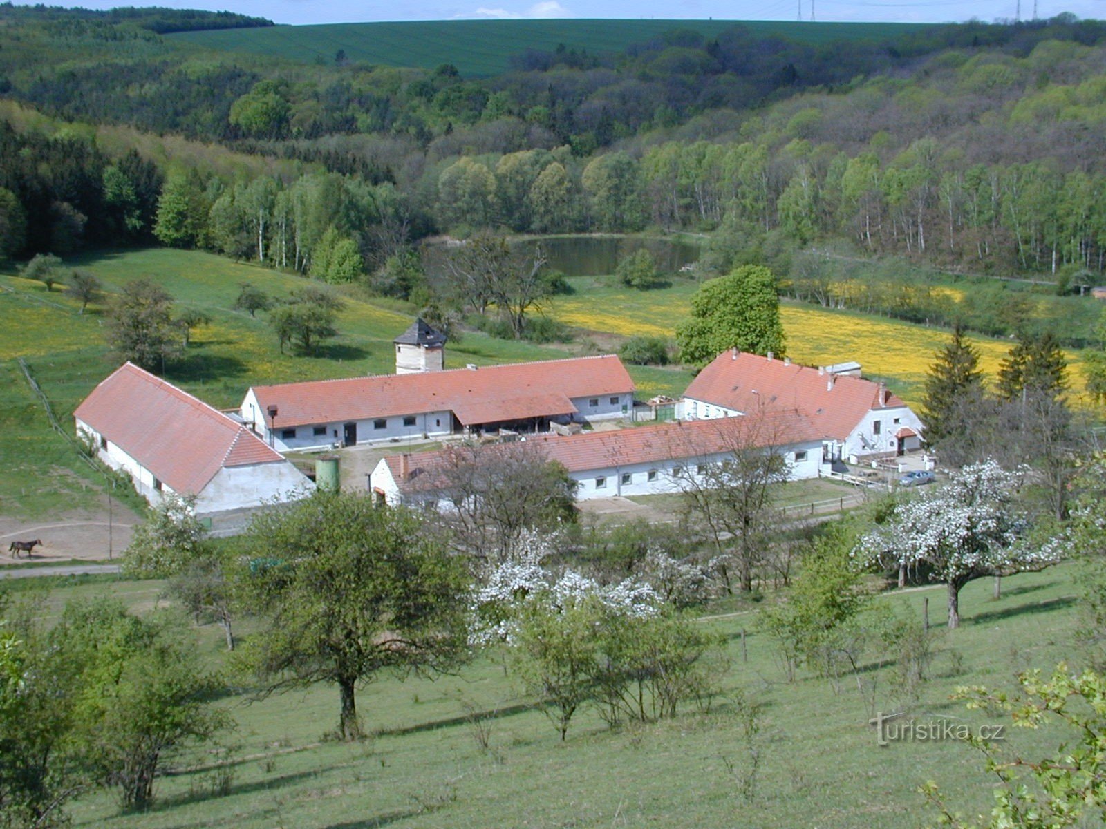 view of the farm from the local hill