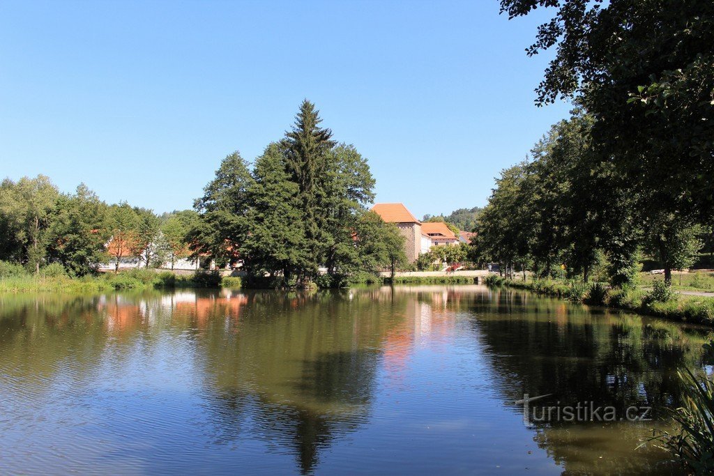 View of the Svojšice fortress across the pond