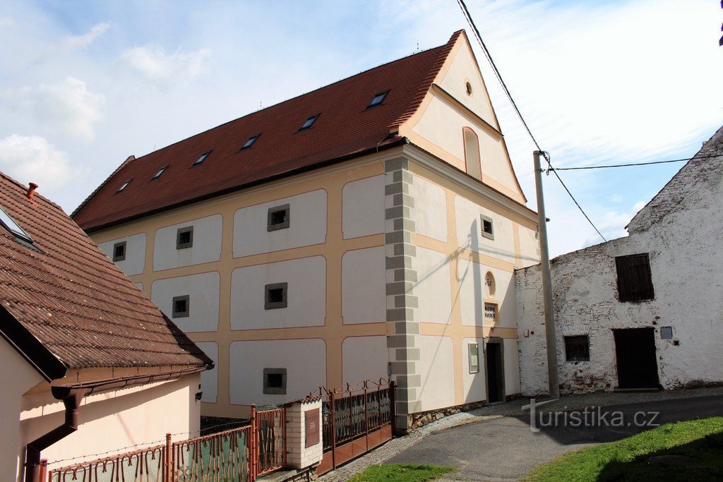 View of the granary from the path to the pond