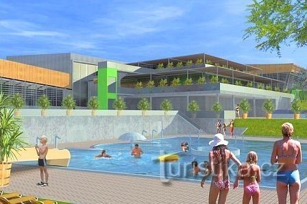 Uitzicht op het buitenzwembad in het centrale deel van het waterpark (uit promotiemateriaal)