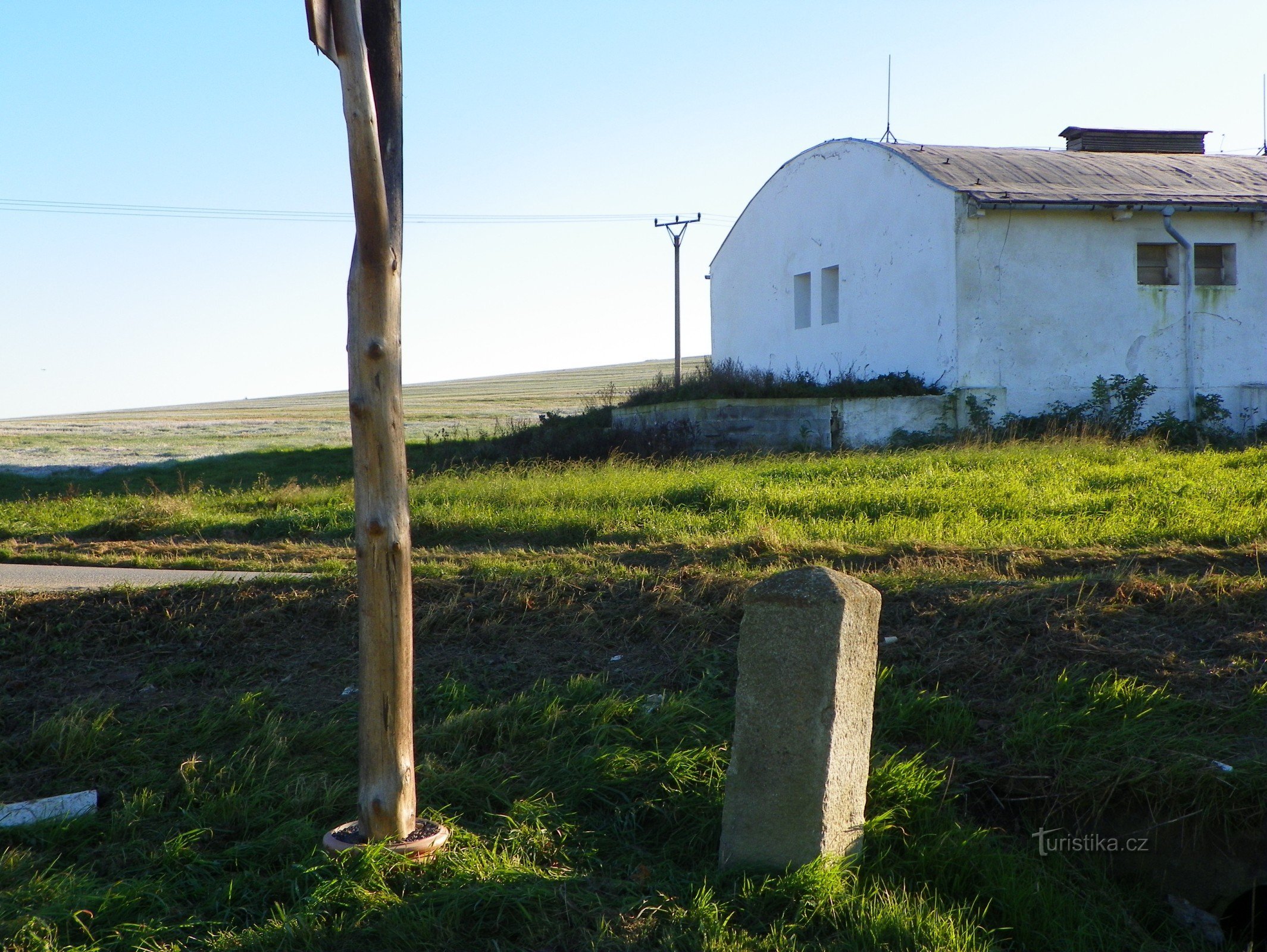 View in the direction of the border - across the cowshed