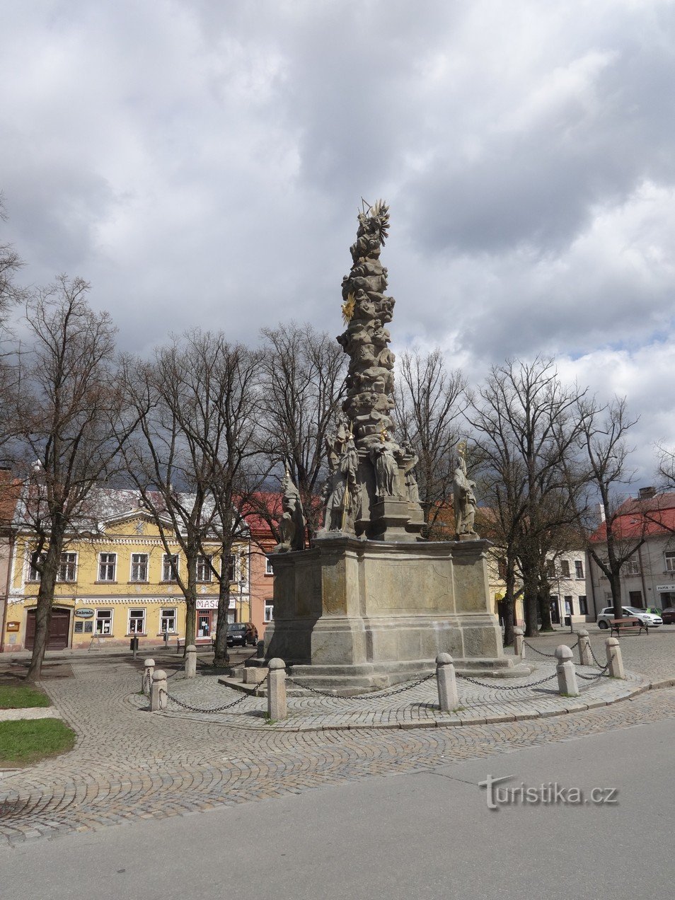 Field and baroque column of the Holy Trinity