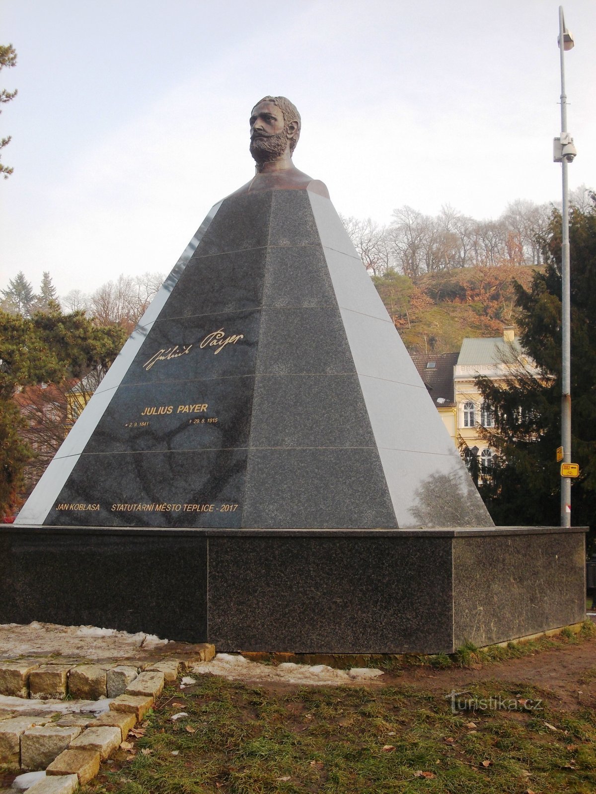 monument with a bust of J. Payer
