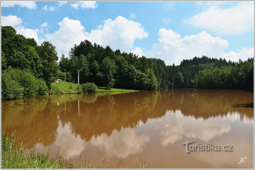 The Zákraví dam overflows after heavy spring rains