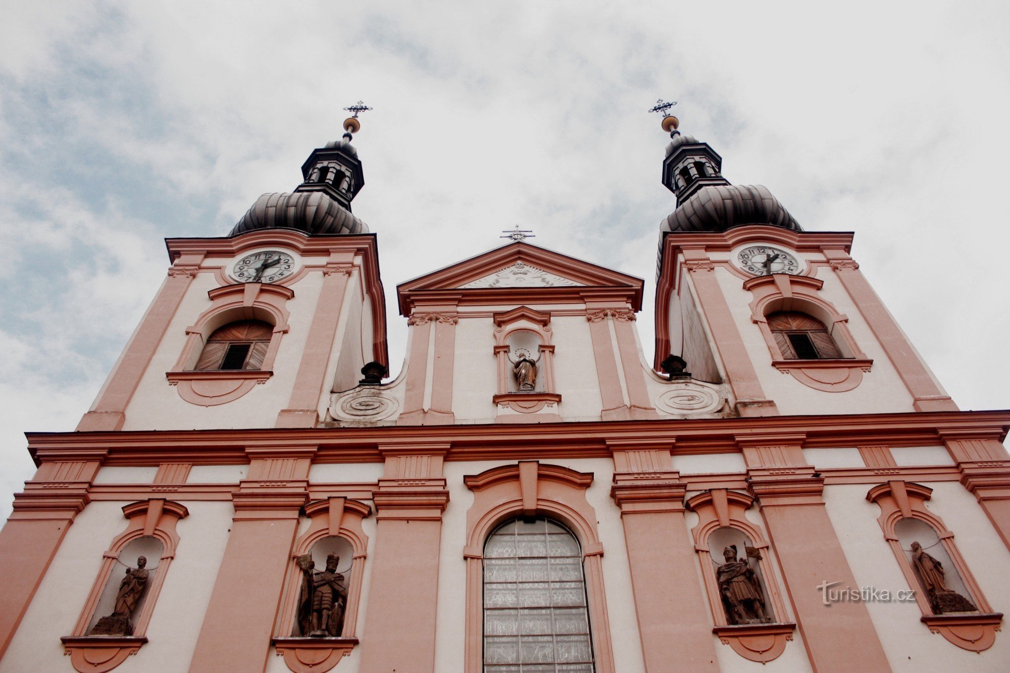 The facade of the Baroque Church of the Assumption of the Virgin Mary in Kojetín