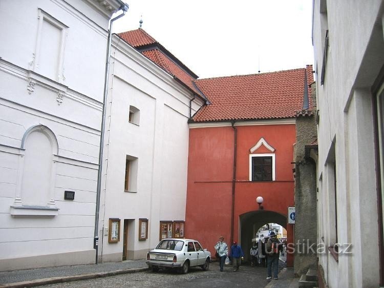 Passing through the castle to the square, theater on the right