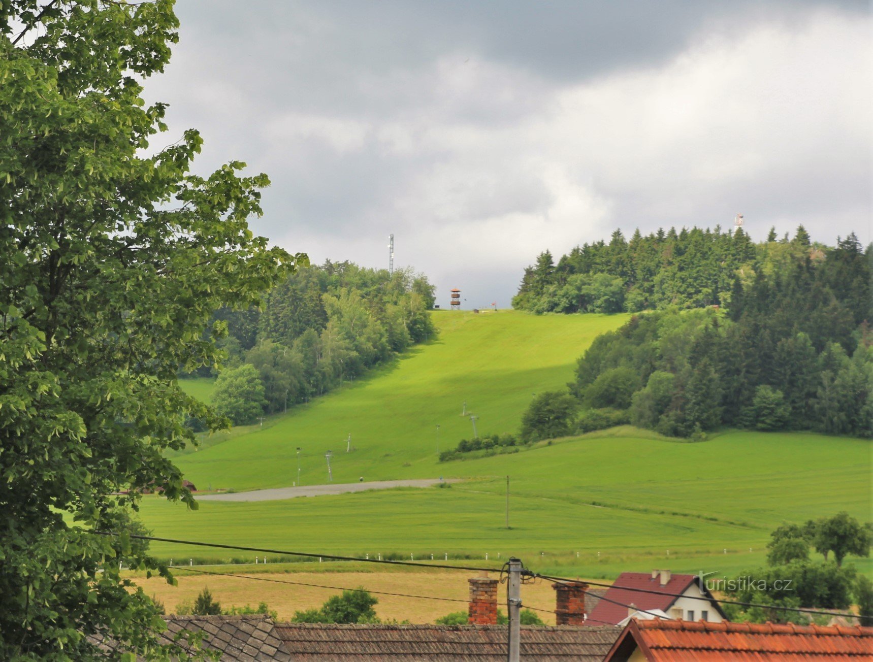 The observation tower is located above the local slope