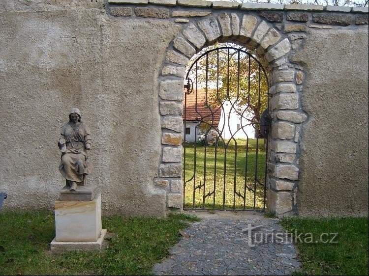 Statue and side gate