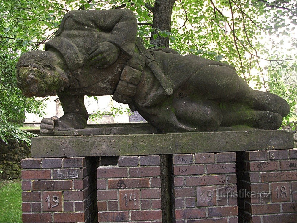 Statue of a wounded soldier in Chlumec