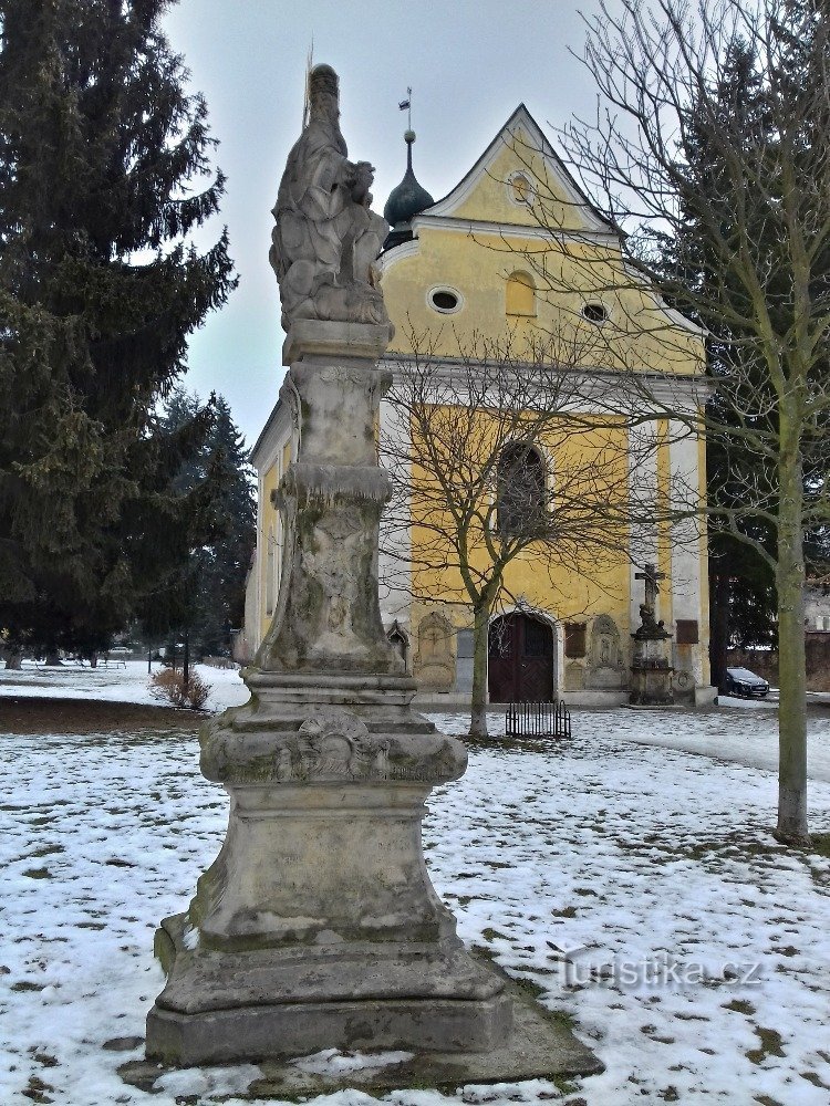 statue in front of the chapel of St. Barbara