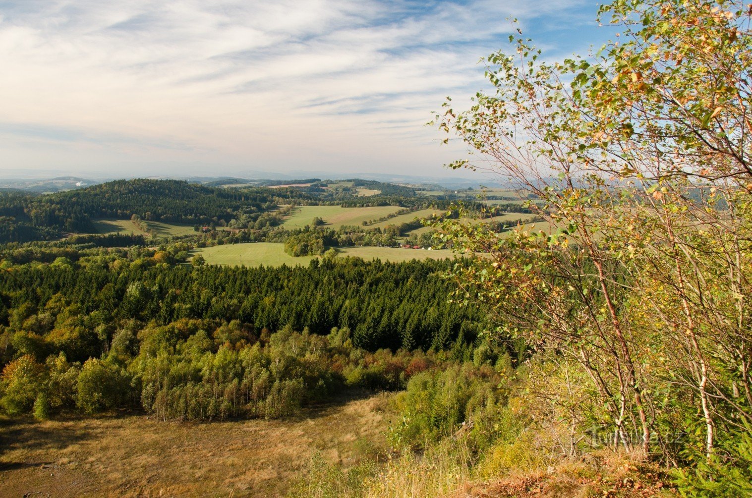 Špičák (841 m above sea level) - view from the edge of the quarry wall to Sedloňovská